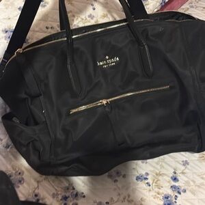 Kate Spade Black Baby Bag with Gold Accents